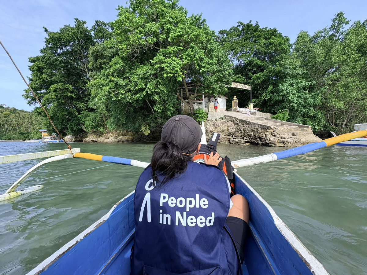 Czarina Jezza Dammo, Education in Emergencies Project manager travel by boat to Sarangani Island to deliver emergency assistance to communities affected by the June 8 earthquake.